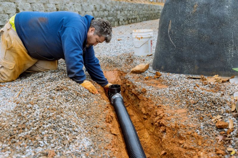 Plumber Repairing a Pipe